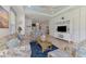 Bright living room with beach decor and TV display at 371 Capulet Dr, Venice, FL 34292
