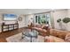 Cozy living room with comfortable seating, stylish decor, and natural light, creating a welcoming atmosphere at 386 Nightingale Rd, Venice, FL 34293
