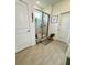 Bright bathroom boasts glass-enclosed shower, neutral tile floor, and decor at 4033 Union Ln, North Port, FL 34288