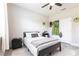 Bedroom with light gray walls featuring a bed and nightstands at 4033 Union Ln, North Port, FL 34288