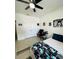 Stylish bedroom with modern decor, gamer theme, and spacious closet at 4033 Union Ln, North Port, FL 34288