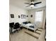 Bright bedroom with modern decor, a workspace, and ample natural light at 4033 Union Ln, North Port, FL 34288