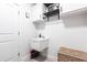 Bright laundry room featuring a sink, storage and decor at 4033 Union Ln, North Port, FL 34288