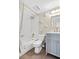 Cozy bathroom featuring a shower/tub combo and vanity with modern lighting and mirror at 408 Cerromar S Cir # 331, Venice, FL 34293