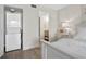 Bright bedroom with access to an in-suite bathroom and a laundry closet at 408 Cerromar S Cir # 331, Venice, FL 34293