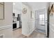 Inviting entryway with stylish decor, kitchen, and natural light at 408 Cerromar S Cir # 331, Venice, FL 34293