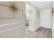 An entry hallway featuring wood flooring, wainscoting, and decor at 408 Cerromar S Cir # 331, Venice, FL 34293