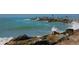 Scenic view of pier where people enjoy fishing and crashing waves at Venice, Florida at 408 Cerromar S Cir # 331, Venice, FL 34293