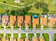 Aerial view showcasing the property, surrounding streets, and well-manicured lawns at 4114 Murfield E Dr, Bradenton, FL 34203