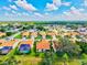 Aerial view of a beautiful community featuring single-story homes with lush landscaping and tiled roofs at 4114 Murfield E Dr, Bradenton, FL 34203