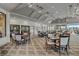 Elegant dining area featuring tables with seating and a neutral color palette throughout the community clubhouse at 4114 Murfield E Dr, Bradenton, FL 34203