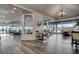 Spacious dining area with large windows providing golf course views, creating an inviting space at 4114 Murfield E Dr, Bradenton, FL 34203