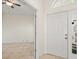 Bright entryway with tile flooring and a view into an adjacent room at 4114 Murfield E Dr, Bradenton, FL 34203