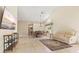 Open concept living area with TV, dining space, neutral colors, and tile flooring at 4114 Murfield E Dr, Bradenton, FL 34203