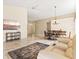 View of open concept living, dining, and entry showing tile floors and neutral colors at 4114 Murfield E Dr, Bradenton, FL 34203