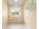 Bright room featuring tile flooring, natural light, and overhead cabinets at 4114 Murfield E Dr, Bradenton, FL 34203