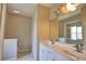 Elegant bathroom with double sinks, ample counter space, and a walk-in shower, designed for comfortable living at 4150 Otoole St, North Port, FL 34291