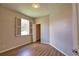 Cozy bedroom with wood floors, neutral paint, and natural light at 4150 Otoole St, North Port, FL 34291