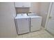 Bright laundry room features new washer and dryer at 4150 Otoole St, North Port, FL 34291