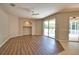 Living room area with a built-in alcove, sliding doors to the pool, and neutral color scheme at 4150 Otoole St, North Port, FL 34291