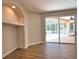 Bright living room features an alcove, sliding doors to the pool area and backyard at 4150 Otoole St, North Port, FL 34291