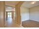 Bright, open living area featuring tile floors leading into a living room with a large sliding glass door at 4150 Otoole St, North Port, FL 34291