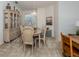 Bright dining area with carpet, a chandelier, and elegant furnishings perfect for gatherings at 4831 Summertree Rd, Venice, FL 34293