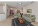 Inviting living room featuring neutral carpet, comfortable sofas, and a stylish coffee table at 4831 Summertree Rd, Venice, FL 34293