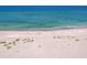 Expansive beach view with soft sand and clear blue water, great for swimming and sunbathing at 500 Park S Blvd # 33, Venice, FL 34285
