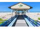 Private gated beach access with covered pavilion and convenient seating to enjoy the views at 500 Park S Blvd # 33, Venice, FL 34285