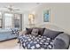 This quaint bedroom offers a twin daybed and lots of natural light at 500 Park S Blvd # 33, Venice, FL 34285