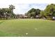 Perfect your short game on this community putting green with seating to watch and enjoy the game at 500 Park S Blvd # 33, Venice, FL 34285