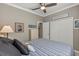 Comfortable bedroom featuring ample closet space and neutral paint at 511 Wexford Dr, Venice, FL 34293