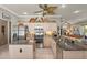 Bright kitchen with stainless steel appliances, granite countertops, and open layout at 511 Wexford Dr, Venice, FL 34293