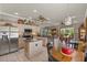Bright kitchen with stainless steel appliances, center island, and adjacent dining area at 511 Wexford Dr, Venice, FL 34293