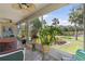 Enclosed patio features hot tub and water views at 511 Wexford Dr, Venice, FL 34293