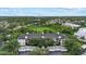 Beautiful aerial view of a condo community nestled among mature trees at 5134 Northridge Rd # 303, Sarasota, FL 34238