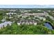 Overhead view of the condo building surrounded by ponds and nature at 5134 Northridge Rd # 303, Sarasota, FL 34238