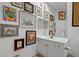 Charming bathroom with unique artwork adorning the walls and classic fixtures at 5134 Northridge Rd # 303, Sarasota, FL 34238