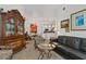 Open living room space with dining area and view into the kitchen at 5134 Northridge Rd # 303, Sarasota, FL 34238