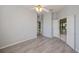 Spacious bedroom with luxury vinyl plank flooring and ample natural light at 519 Catalina Isles Cir, Venice, FL 34292