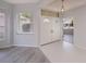 Bright foyer with large double doors, neutral paint, and ample natural light at 519 Catalina Isles Cir, Venice, FL 34292