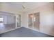 Enclosed patio with ceiling fan and sliding glass doors to interior rooms at 519 Catalina Isles Cir, Venice, FL 34292