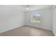 Bright bedroom featuring a ceiling fan and a window with natural light at 5306 Maccaughey Dr, North Port, FL 34287