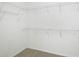 Walk-in closet with ample wire shelving for storage at 5306 Maccaughey Dr, North Port, FL 34287