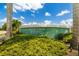 Entrance to Gulf View Estates, a deed-restricted community with lush green landscaping at 5818 Harrison Rd, Venice, FL 34293