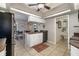 Functional kitchen with a central island, granite countertops, and a convenient layout for everyday use at 5818 Harrison Rd, Venice, FL 34293