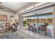 Inviting living room leading to a screened lanai and a refreshing pool at 5818 Harrison Rd, Venice, FL 34293