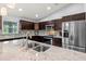 Gourmet kitchen showcasing granite countertops, stainless appliances and fixtures at 5954 Gottfried Ln, North Port, FL 34291