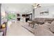 An open concept kitchen and living room with an eat-in kitchen table at 5954 Gottfried Ln, North Port, FL 34291